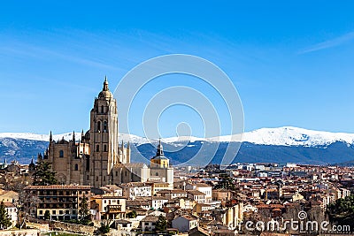 Segovia, Spain â€“ View of the Cathedral and the Sierra the Guadarrama behind in Winter Stock Photo